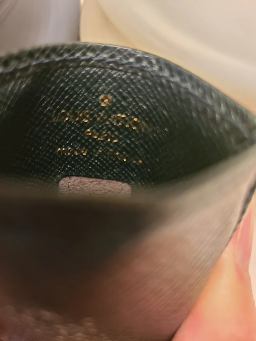 Authentic Louis Vuitton card holder in Taiga leather